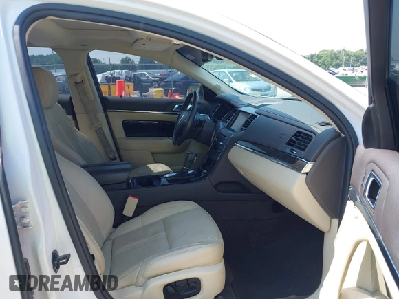 2013 Lincoln MKS with VIN 1LNHL9DK2DG606838, listed as a IAAI auction lot 42454441 with 163,475 mi miles and . Bid and sale history available at DreamBid. Image 5.