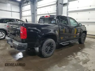 2021 Chevrolet Colorado 4WD Z71 with VIN 1GCGTDEN8M1171810, listed as a Copart auction lot 57409115 with 100,579 mi miles and Salvage title. Bid and sale history available at DreamBid. Image 3.