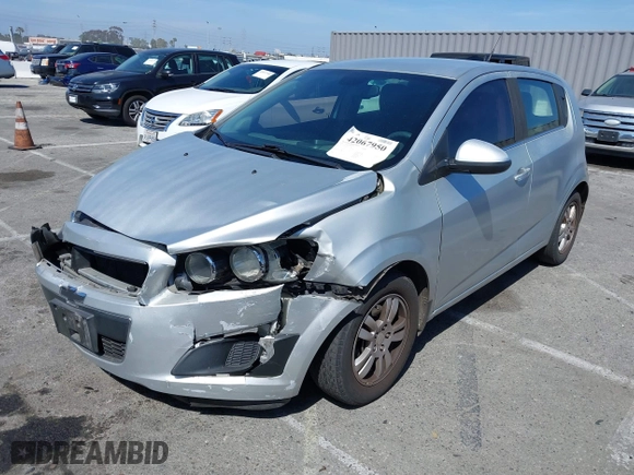 2013 Chevrolet Sonic LT with VIN 1G1JC6SG0D4202398, listed as a IAAI auction lot 42067950 with 141,114 mi miles. Bid and sale history available at carsss.com. Image 2.