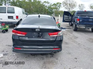 2016 Kia Optima LX with VIN 5XXGT4L31GG024240, listed as a IAAI auction lot 41727309 with 70,031 mi miles. Bid and sale history available at carsss.com. Image 16.