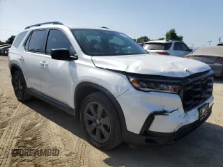 2023 Honda Pilot Sport with VIN 5FNYG2H30PB012041, listed as a Copart auction lot 62038135 with 30,558 mi miles and Salvage title. Bid and sale history available at DreamBid. Image 4.