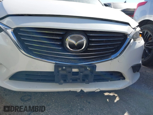 2017 Mazda 6 Grand Touring with VIN JM1GL1W57H1126716, listed as a IAAI auction lot 41619715 with 105,332 mi miles and . Bid and sale history available at DreamBid. Image 21.