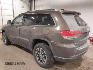 2018 Jeep Grand Cherokee Limited with VIN 1C4RJFBG2JC139502, listed as a IAAI auction lot 41372877 with 145,877 mi miles and . Bid and sale history available at DreamBid. Image 3.