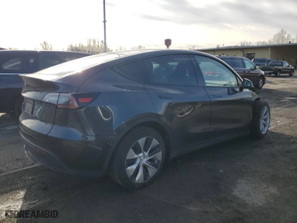 2024 Tesla Model Y with VIN 7SAYGDED1RF016792, listed as a Copart auction lot 50057345 with 6,749 mi miles and Salvage Title. Bid and sale history available at carsss.com. Image 3.