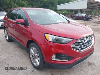 2022 Ford Edge Titanium z VIN 2FMPK4K95NBB06781, wystawiony jako IAAI lot #42460618 z przebiegiem 64 015 mil mil oraz . Historia ofert i sprzedaży dostępna na DreamBid. Obrazek 1.