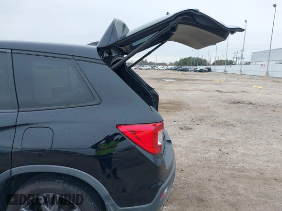 2019 Honda Passport EX-L with VIN 5FNYF7H59KB003011, listed as a IAAI auction lot 41563219 with 78,239 mi miles and . Bid and sale history available at carsss.com. Image 18.