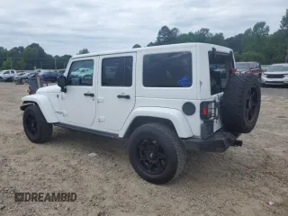 2012 Jeep Wrangler Unlimited Sahara with VIN 1C4HJWEG8CL126053, listed as a Copart auction lot 54363285 with 88,014 mi miles and Salvage title. Bid and sale history available at DreamBid. Image 2.