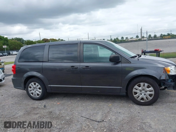 2019 Dodge Grand Caravan SE with VIN 2C4RDGBGXKR796974, listed as a IAAI auction lot 42008704 with 129,229 mi miles and . Bid and sale history available at DreamBid. Image 13.