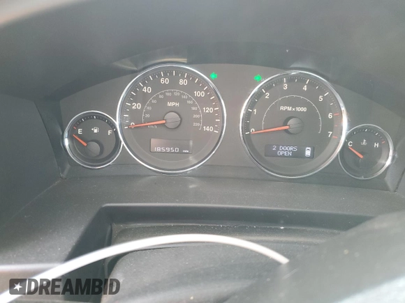 2008 Jeep Commander Sport with VIN 1J8HG48K18C184699, listed as a Copart auction lot 54739305 with 185,950 mi miles and Salvage title. Bid and sale history available at DreamBid. Image 9.