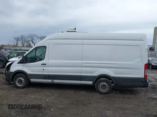 2022 Ford Transit Cargo with VIN 1FTBW3X83NKA44302, listed as a IAAI auction lot 41684165 with 33,463 mi miles and . Bid and sale history available at DreamBid. Image 15.