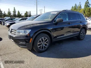 2020 Volkswagen Tiguan SE with VIN 3VV3B7AX2LM105721, listed as a Copart auction lot 79272814 with 59,887 mi miles and Salvage Title. Bid and sale history available at DreamBid. Image 1.