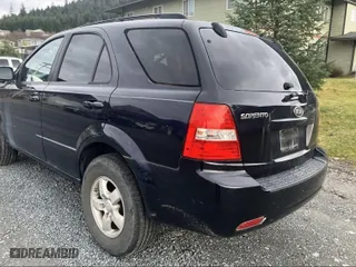 2009 Kia Sorento LX with VIN KNDJD735095890122, listed as a IAAI auction lot 41049479 with 153,333 mi miles. Bid and sale history available at carsss.com. Image 3.