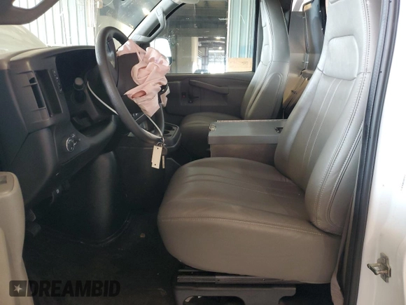 2024 Chevrolet Express Cargo with VIN 1GCWGAFP2R1174904, listed as a Copart auction lot 63218715 with 20,859 mi miles and Clean title. Bid and sale history available at DreamBid. Image 7.
