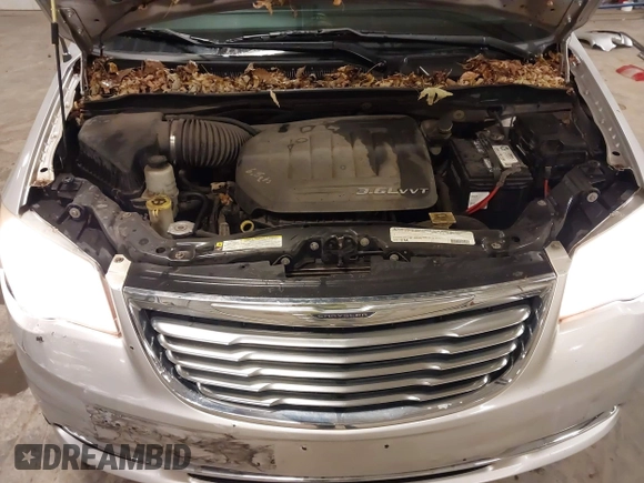 2011 Chrysler Town & Country Touring z VIN 2A4RR5DGXBR723116, wystawiony jako IAAI lot #42156888 z przebiegiem 177 591 mil mil oraz . Historia ofert i sprzedaży dostępna na DreamBid. Obrazek 10.