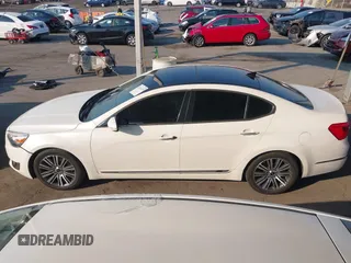 2014 Kia Cadenza Premium with VIN KNALN4D79E5157353, listed as a IAAI auction lot 41291153 with 141,049 mi miles. Bid and sale history available at carsss.com. Image 15.