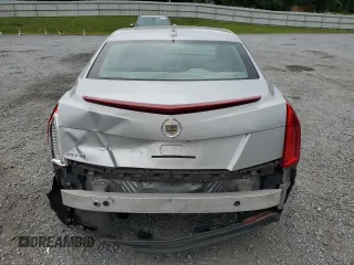 2013 Cadillac ATS с VIN 1G6AA5RA8D0111785, выставлен на аукционе Copart как лот 55612915 с пробегом 139 947 миль миль и Списание • Salvage title. История ставок и продаж доступна на DreamBid. Изображение 6.