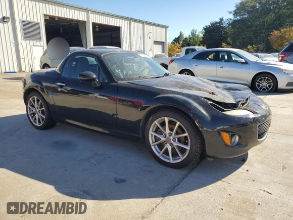 2010 Mazda MX-5 Miata Grand Touring with VIN JM1NC2FFXA0206089, listed as a Copart auction lot 76752674 with 212,584 mi miles and Salvage title. Bid and sale history available at DreamBid. Image 4.