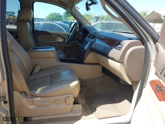 2012 Chevrolet Suburban LT with VIN 1GNSCJE03CR128206, listed as a IAAI auction lot 42002119 with 329,078 mi miles. Bid and sale history available at carsss.com. Image 5.