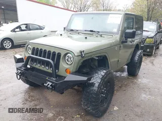 2007 Jeep Wrangler X with VIN 1J4FA24127L231409, listed as a IAAI auction lot 41971429 with 181,855 mi miles and . Bid and sale history available at carsss.com. Image 2.