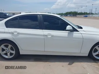 2013 BMW 3 Series 320i with VIN WBA3B1C50DK129576, listed as a IAAI auction lot 42393038 with 160,370 mi miles and . Bid and sale history available at DreamBid. Image 13.