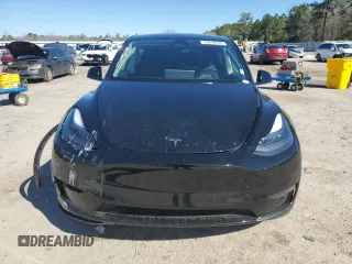 2023 Tesla Model Y Performance with VIN 7SAYGDEF2PF828973, listed as a Copart auction lot 45276585 with 15,750 mi miles and Salvage Title. Bid and sale history available at DreamBid. Image 5.