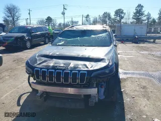2020 Jeep Cherokee Latitude with VIN 1C4PJLCB1LD525088, listed as a IAAI auction lot 41364826 with 68,127 mi miles. Bid and sale history available at carsss.com. Image 6.