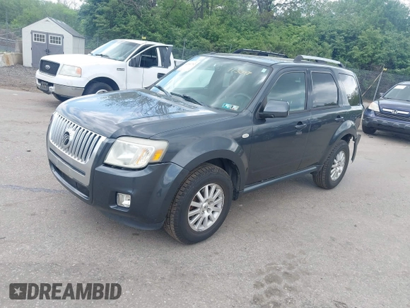 2009 Mercury Mariner Premier z VIN 4M2CU87719KJ13048, wystawiony jako IAAI lot #42181702 z przebiegiem 138 094 mil mil oraz . Historia ofert i sprzedaży dostępna na DreamBid. Obrazek 2.