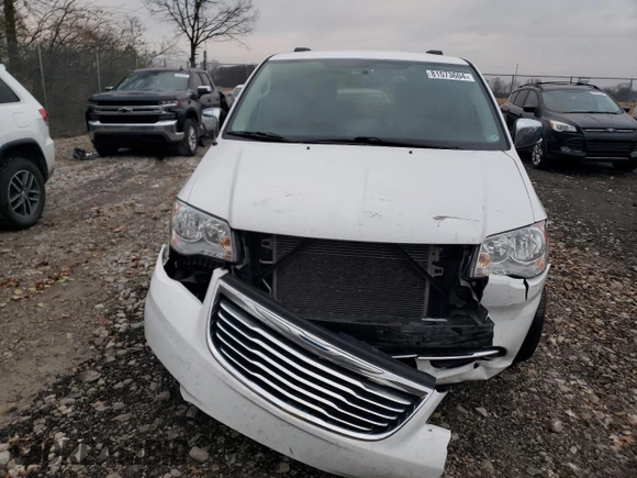 2015 Chrysler Town & Country Touring-L with VIN 2C4RC1CG2FR697750, listed as a Copart auction lot 81573604 with 168,701 mi miles and Salvage Title. Bid and sale history available at carsss.com. Image 5.