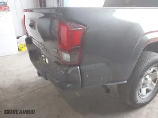 2019 Toyota Tacoma 4WD SR with VIN 3TMCZ5AN5KM204187, listed as a IAAI auction lot 40318136 with 105,409 mi miles. Bid and sale history available at carsss.com. Image 6.