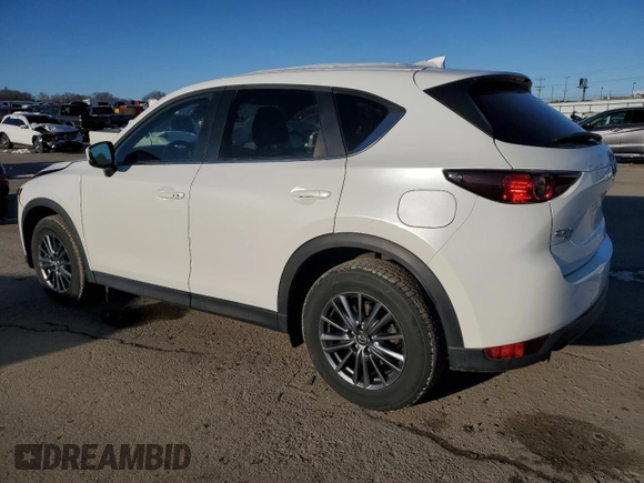 2021 Mazda CX-5 Touring with VIN JM3KFBCM9M0336910, listed as a Copart auction lot 48032275 with 65,515 mi miles and Salvage Title. Bid and sale history available at carsss.com. Image 2.