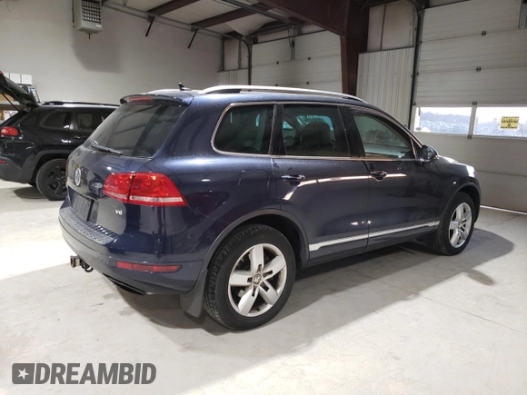 2012 Volkswagen Touareg Exec with VIN WVGEF9BP4CD011773, listed as a Copart auction lot 82461264 with 230,231 mi miles and Clean Title. Bid and sale history available at DreamBid. Image 3.