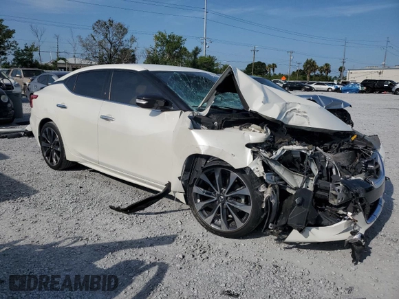 2016 Nissan Maxima SR with VIN 1N4AA6AP5GC421677, listed as a Copart auction lot 58738515 with 140,920 mi miles and Salvage title. Bid and sale history available at DreamBid. Image 4.