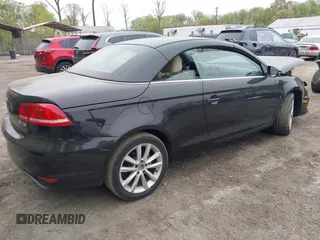 2014 Volkswagen Eos Komfort with VIN WVWBW8AH2EV001719, listed as a IAAI auction lot 42080290 with 105,661 mi miles and . Bid and sale history available at DreamBid. Image 4.