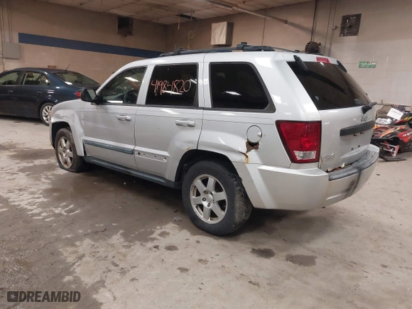2009 Jeep Grand Cherokee Laredo with VIN 1J8GR48K89C553694, listed as a IAAI auction lot 41984820 with 196,266 mi miles. Bid and sale history available at carsss.com. Image 3.