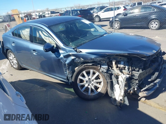2016 Mazda 6 i Sport with VIN JM1GJ1U57G1451597, listed as a IAAI auction lot 41658184 with 142,504 mi miles and . Bid and sale history available at DreamBid. Image 1.