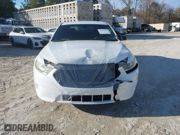 2014 Ford Police Interceptor z VIN 1FAHP2MK2EG125804, wystawiony jako IAAI lot #41297103 z przebiegiem 99 340 mil mil oraz . Historia ofert i sprzedaży dostępna na DreamBid. Obrazek 12.