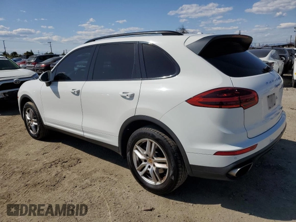 2016 Porsche Cayenne with VIN WP1AA2A20GKA12711, listed as a Copart auction lot 52104335 with 93,396 mi miles and Salvage Title. Bid and sale history available at carsss.com. Image 2.