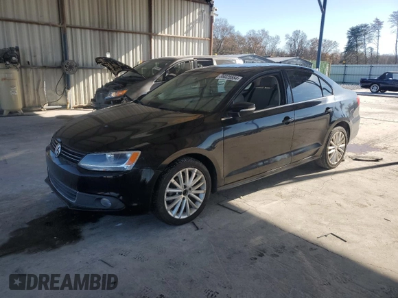 2012 Volkswagen Jetta Sedan SEL w/Sunroof with VIN 3VWLX7AJ2CM304776, listed as a Copart auction lot 86025554 with 103,784 mi miles and Salvage Title. Bid and sale history available at carsss.com. Image 1.