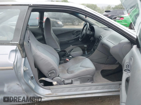 1995 Ford Probe z VIN 1ZVLT20A6S5154983, wystawiony jako IAAI lot #42301574 z przebiegiem 128 515 mil mil oraz . Historia ofert i sprzedaży dostępna na DreamBid. Obrazek 5.