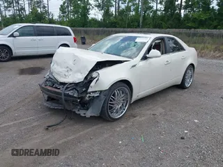 2009 Cadillac CTS RWD z VIN 1G6DF577390175097, wystawiony jako IAAI lot #42359549 z przebiegiem 217 286 mil mil oraz . Historia ofert i sprzedaży dostępna na DreamBid. Obrazek 2.