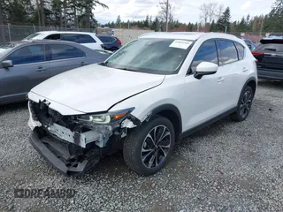 2023 Mazda CX-5 2.5 S Premium Plus Package with VIN JM3KFBEM3P0236481, listed as a IAAI auction lot 41815369 with 34,679 mi miles. Bid and sale history available at carsss.com. Image 2.