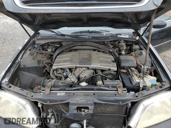 2000 Acura RL w/Navigation System z VIN JH4KA9662YC012617, wystawiony jako Copart lot #85901934 z przebiegiem Nie podano mil oraz Szkoda całkowita • Salvage title. Historia ofert i sprzedaży dostępna na DreamBid. Obrazek 11.