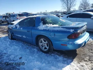 1999 Pontiac Firebird with VIN 2G2FS22K2X2206111, listed as a Copart auction lot 88034565 with 0 mi miles and Salvage Title. Bid and sale history available at carsss.com. Image 2.