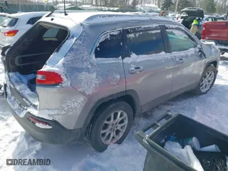 2015 Jeep Cherokee Latitude with VIN 1C4PJMCB1FW776160, listed as a IAAI auction lot 41345082 with 94,769 mi miles. Bid and sale history available at carsss.com. Image 4.