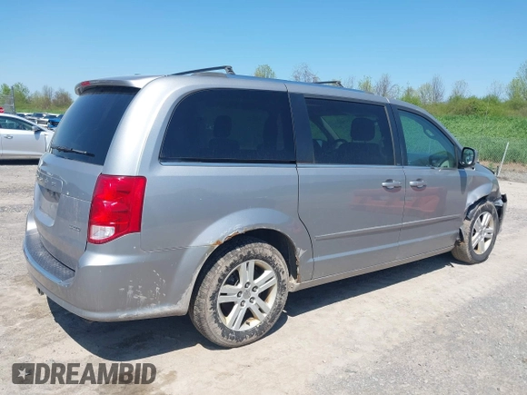 2013 Dodge Grand Caravan Crew with VIN 2C4RDGDG1DR800538, listed as a IAAI auction lot 42211140 with 138,647 mi miles and . Bid and sale history available at DreamBid. Image 4.