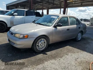 1998 Toyota Corolla VE with VIN 1NXBR12E0WZ081253, listed as a Copart auction lot 62477135 with Not provided miles and Salvage title. Bid and sale history available at DreamBid. Image 1.
