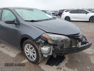 2018 Toyota Corolla L z VIN 5YFBURHE7JP831763, wystawiony jako IAAI lot #41539485 z przebiegiem 95 495 mil mil oraz . Historia ofert i sprzedaży dostępna na DreamBid. Obrazek 6.