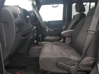 2012 Jeep Wrangler Unlimited Sport with VIN 1C4HJWDG8CL122067, listed as a Copart auction lot 58549805 with 124,658 mi miles and Clean title. Bid and sale history available at DreamBid. Image 7.