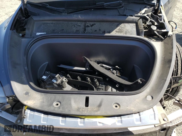 2024 Tesla Model Y Long Range z VIN 7SAYGAEE0RF101971, wystawiony jako Copart lot #58794335 z przebiegiem 16 099 mil mil oraz Szkoda całkowita • Salvage title. Historia ofert i sprzedaży dostępna na DreamBid. Obrazek 11.