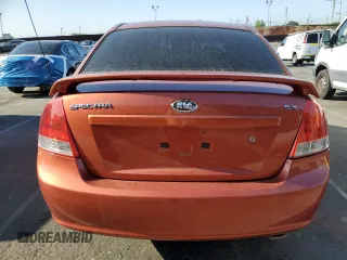 2009 Kia Spectra EX with VIN KNAFE222995027376, listed as a Copart auction lot 52406025 with 73,692 mi miles and Salvage Title. Bid and sale history available at DreamBid. Image 6.